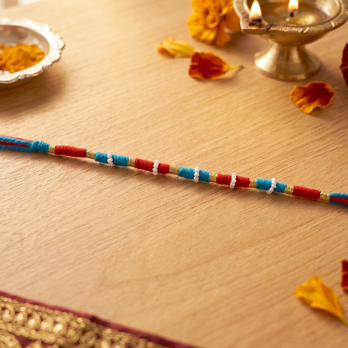 Handmade Rakhi Bracelet - Blue & Red Thread with Golden Beads (1 Pc) - Happy Price - Image 3