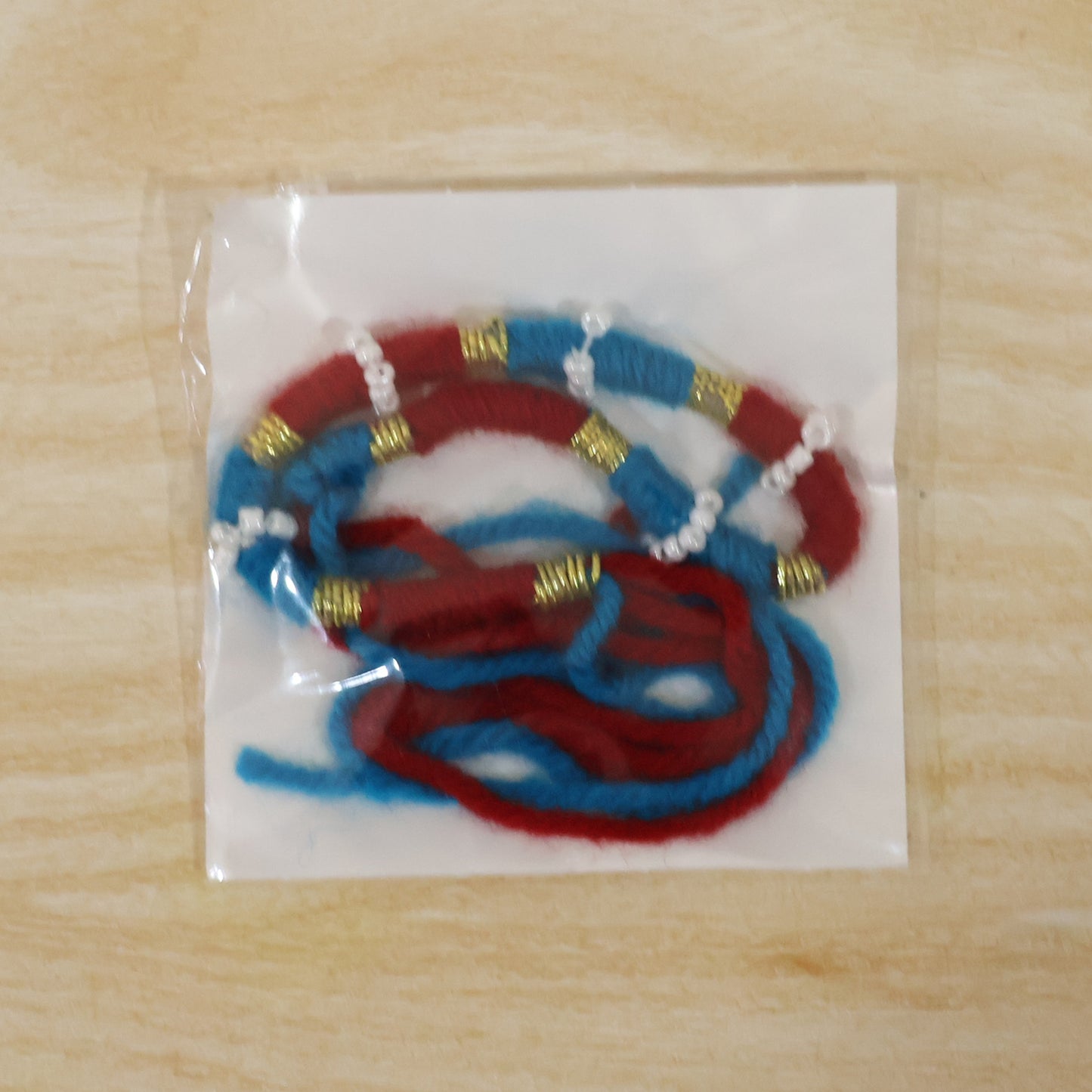 Handmade Rakhi Bracelet - Blue & Red Thread with Golden Beads (1 Pc) - Happy Price - Image 7