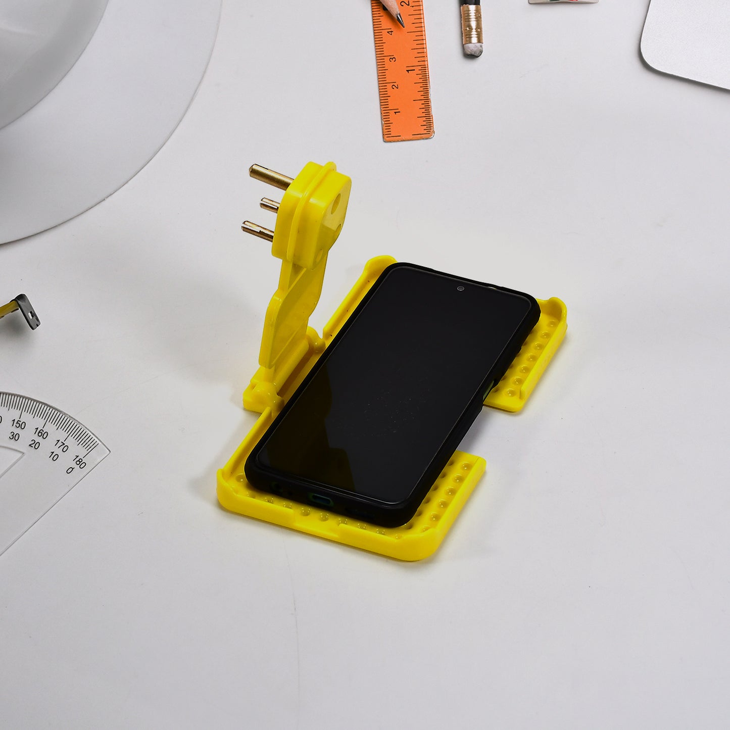 Multi-purpose Wall Holder Stand For Charging Mobile Just Fit In Socket And Hang (Yellow) - Happy Price - Image 3
